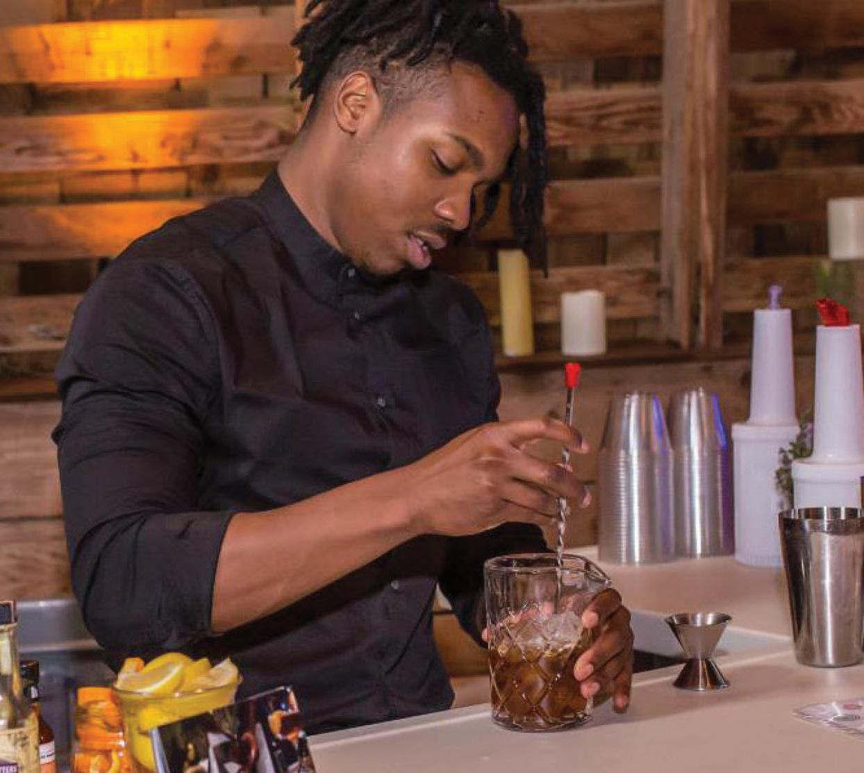 Crafting Cocktail at Revolution By The Barrel