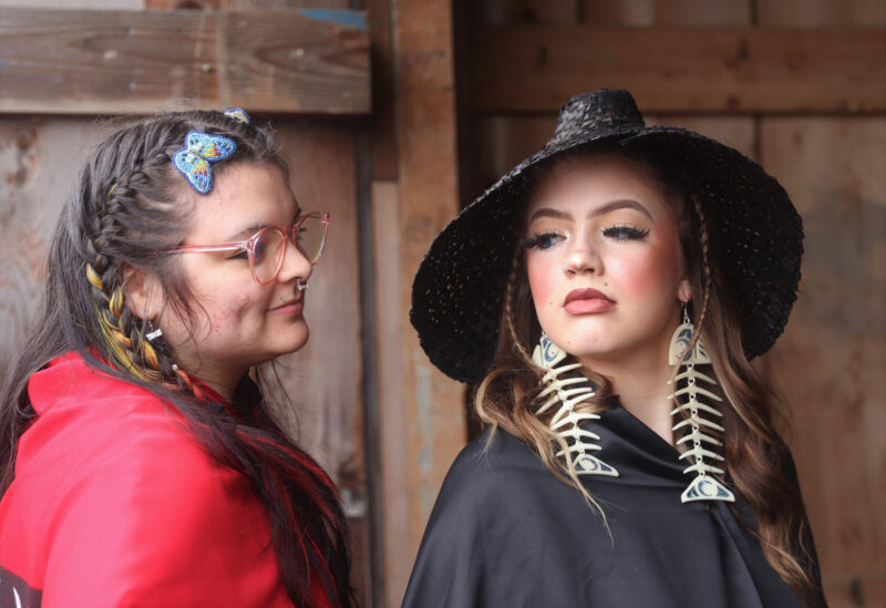 Native American women wearing handmade jewelry