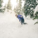 Snowboarding in powder at Stevens Pass