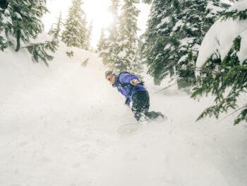 Snowboarding in powder at Stevens Pass