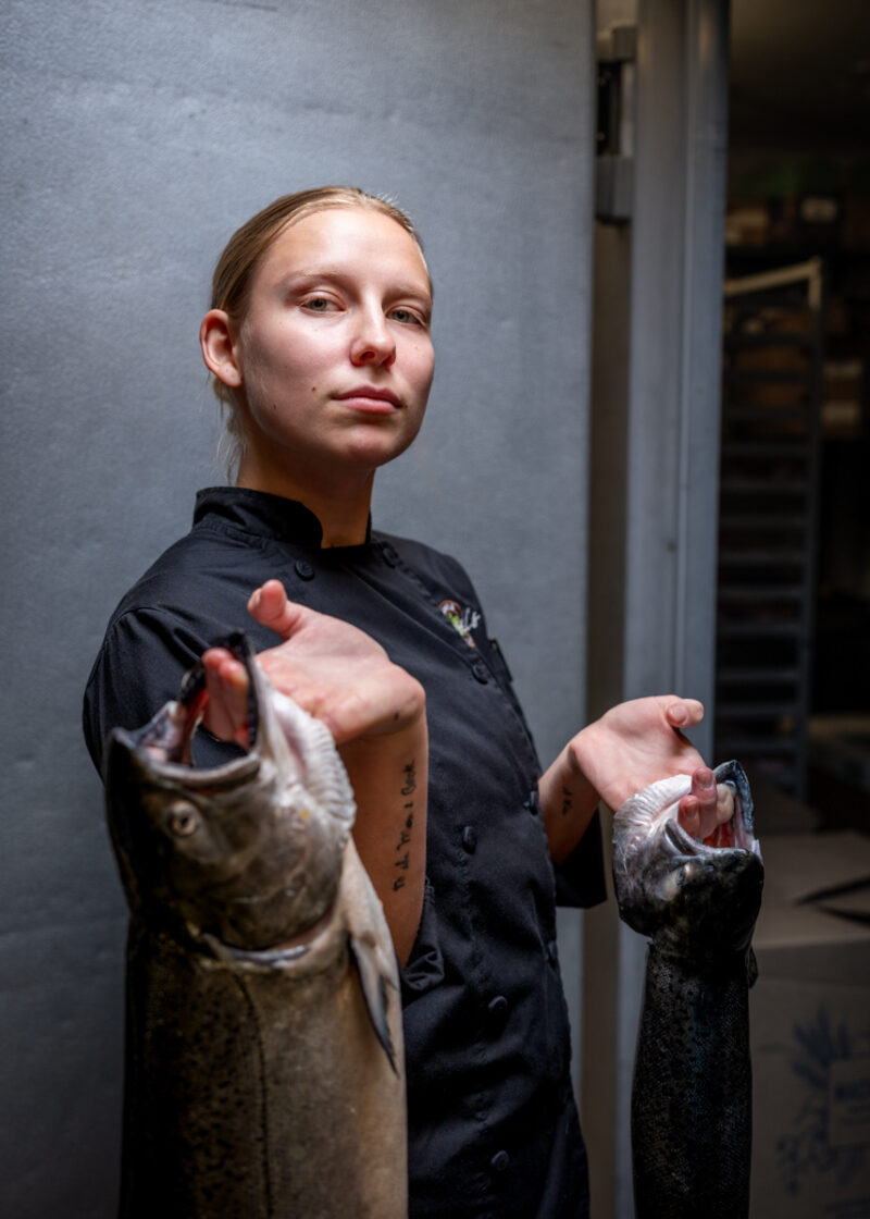 Star chef holds wild caught fish to be served at Russells Restaurant & Loft