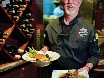 Black Fish Grill Chef with Plated Food