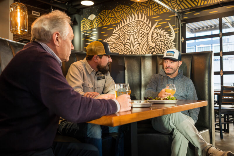 Tapped Millcreek 3 partners at a booth