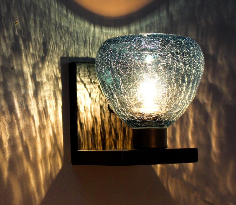 Aqua blue sconce made from recyled glass