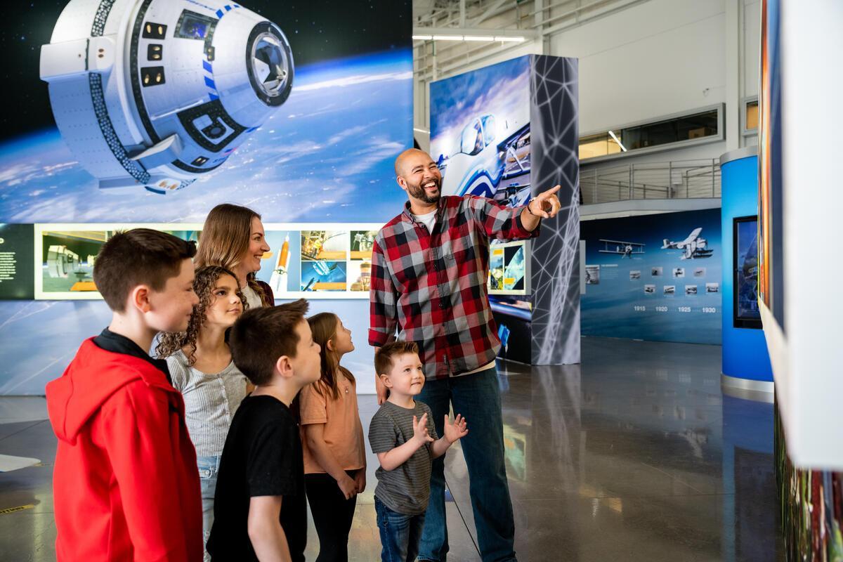 Children Looking at a Future of Flight Exhibit