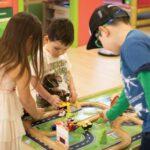 everett children playing toy train