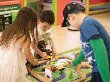 everett children playing toy train
