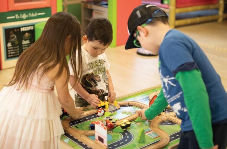 everett children playing toy train