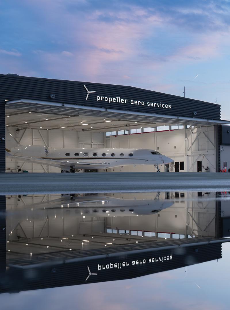 paine field hangar reflection private jet